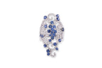 A SAPPHIRE AND DIAMOND RING