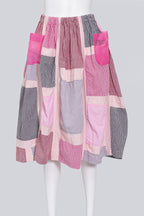 COMME DES GARCONS TRICOT - A 2017 PINK CANVAS CHECKED PATCHWORK SKIRT