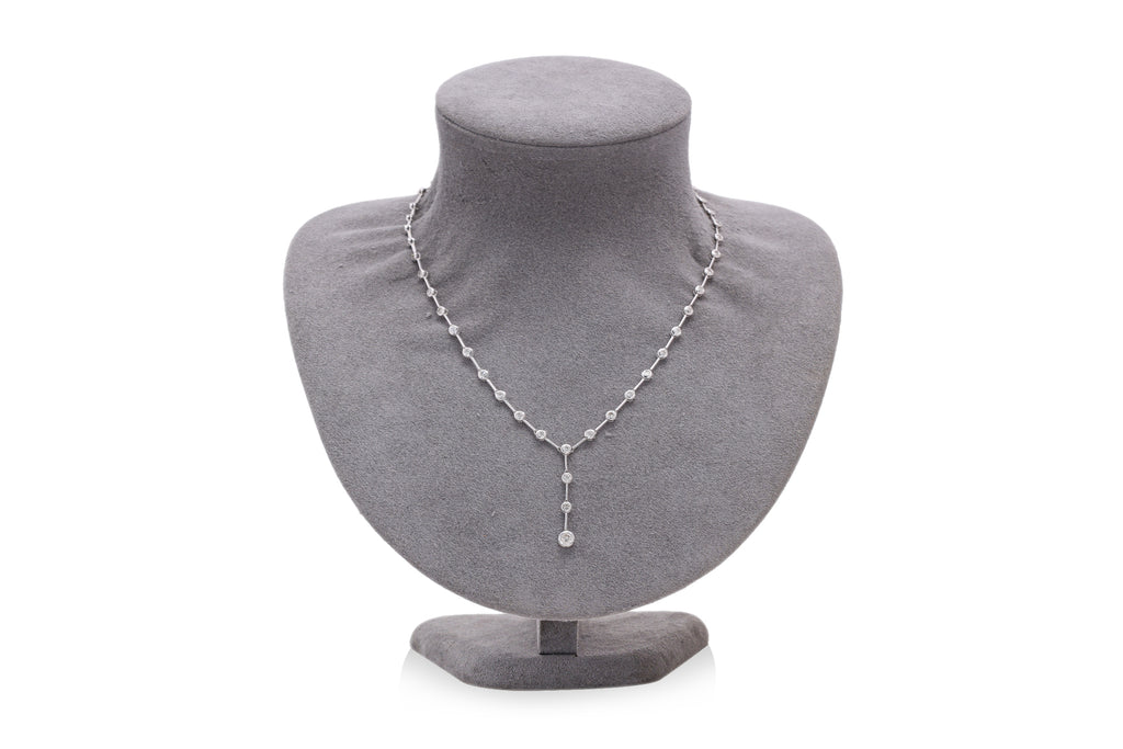A BEZEL SET DIAMOND NECKLACE