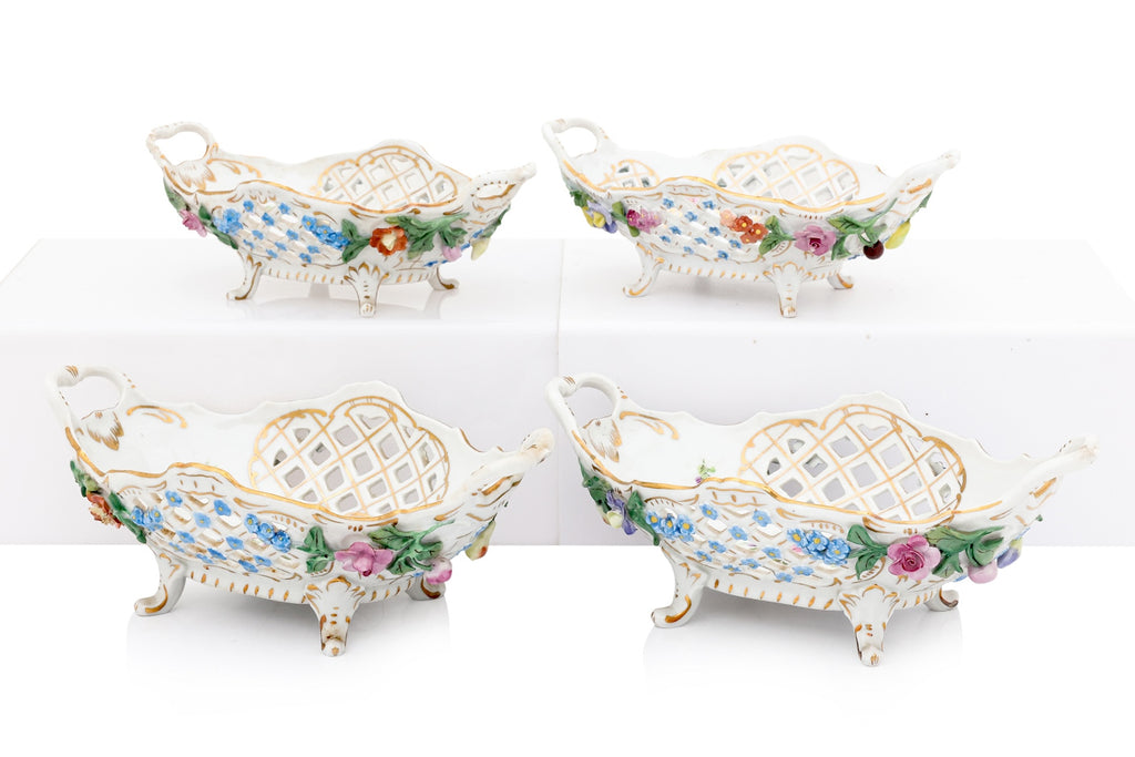 A GROUP OF FOUR DRESDEN PORCELAIN BASKETS