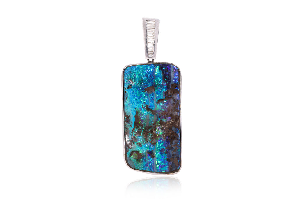 A LARGE BOULDER OPAL AND DIAMOND PENDANT