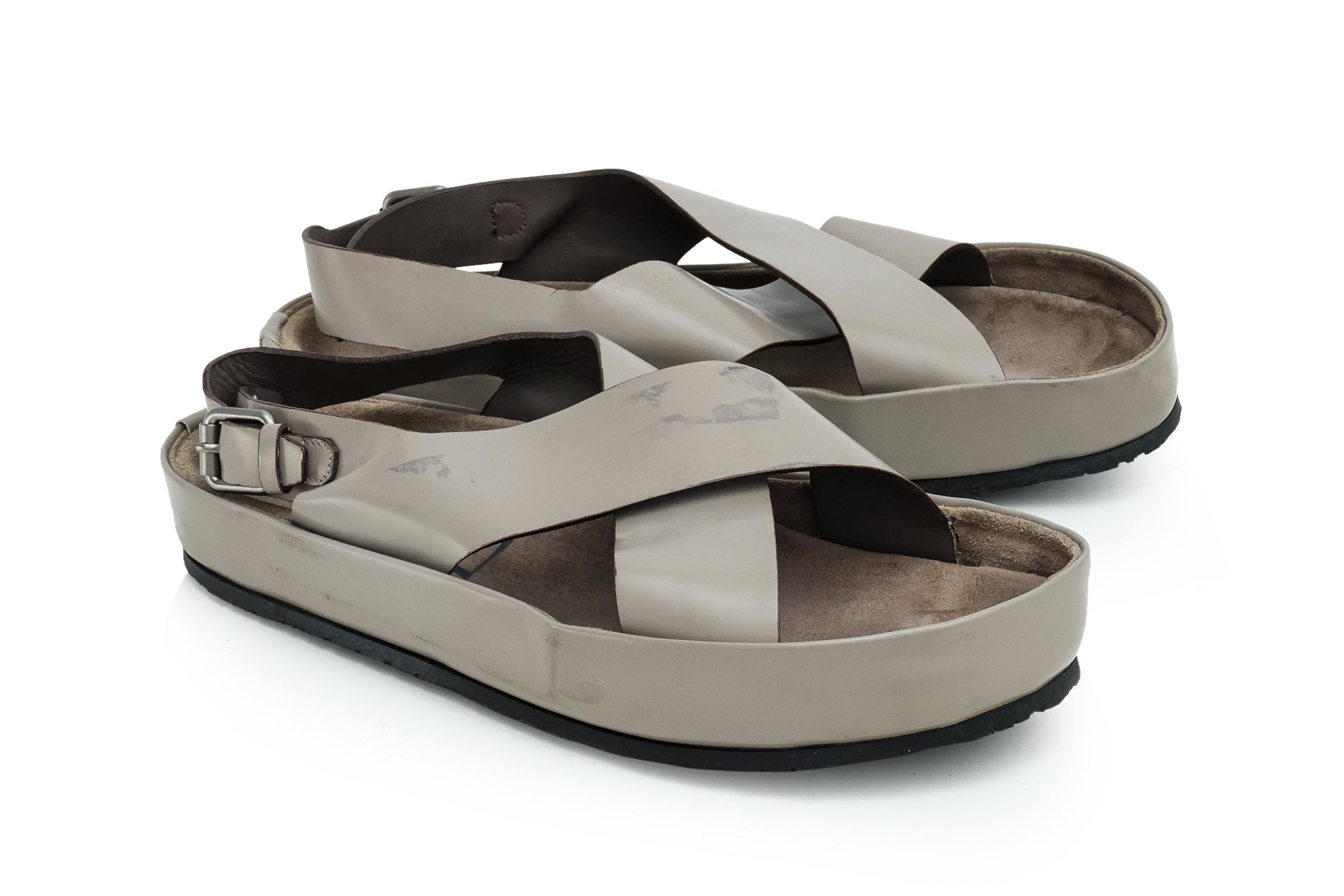YVES SAINT LAURENT - A PAIR OF GREY LEATHER CROSS-STRAP SANDALS