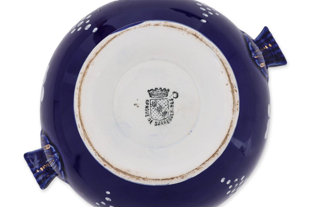 A SARREGUEMINES RICE BOWL AND A BOMEHIAN RUBY GLASS VASE