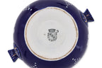 A SARREGUEMINES RICE BOWL AND A BOMEHIAN RUBY GLASS VASE