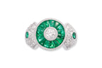 A DIAMOND AND EMERALD RING