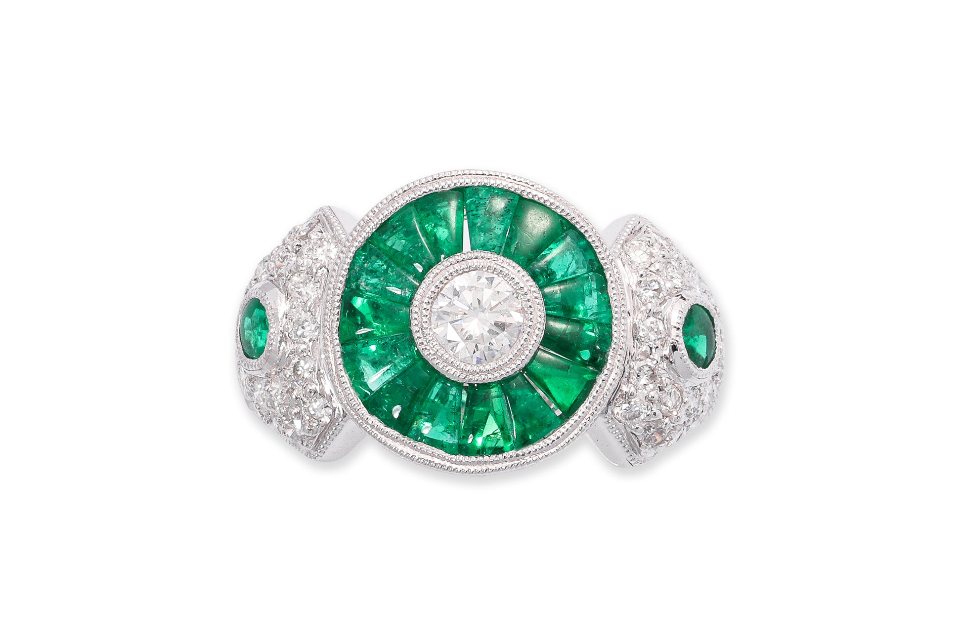 A DIAMOND AND EMERALD RING