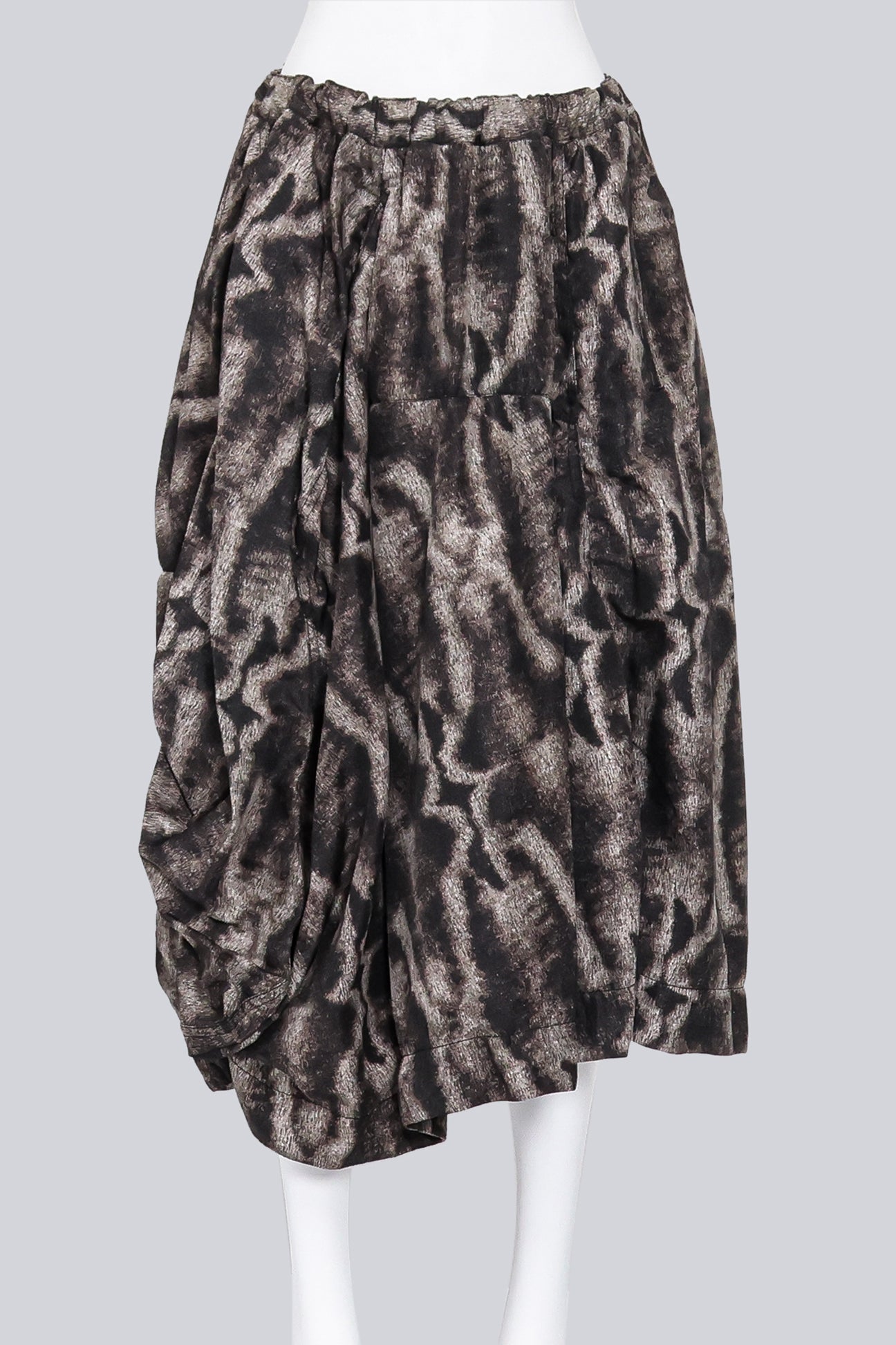 COMME DES GARCONS - A 2015 MUTED BROWN AND BEIGE FUR PRINT SKIRT