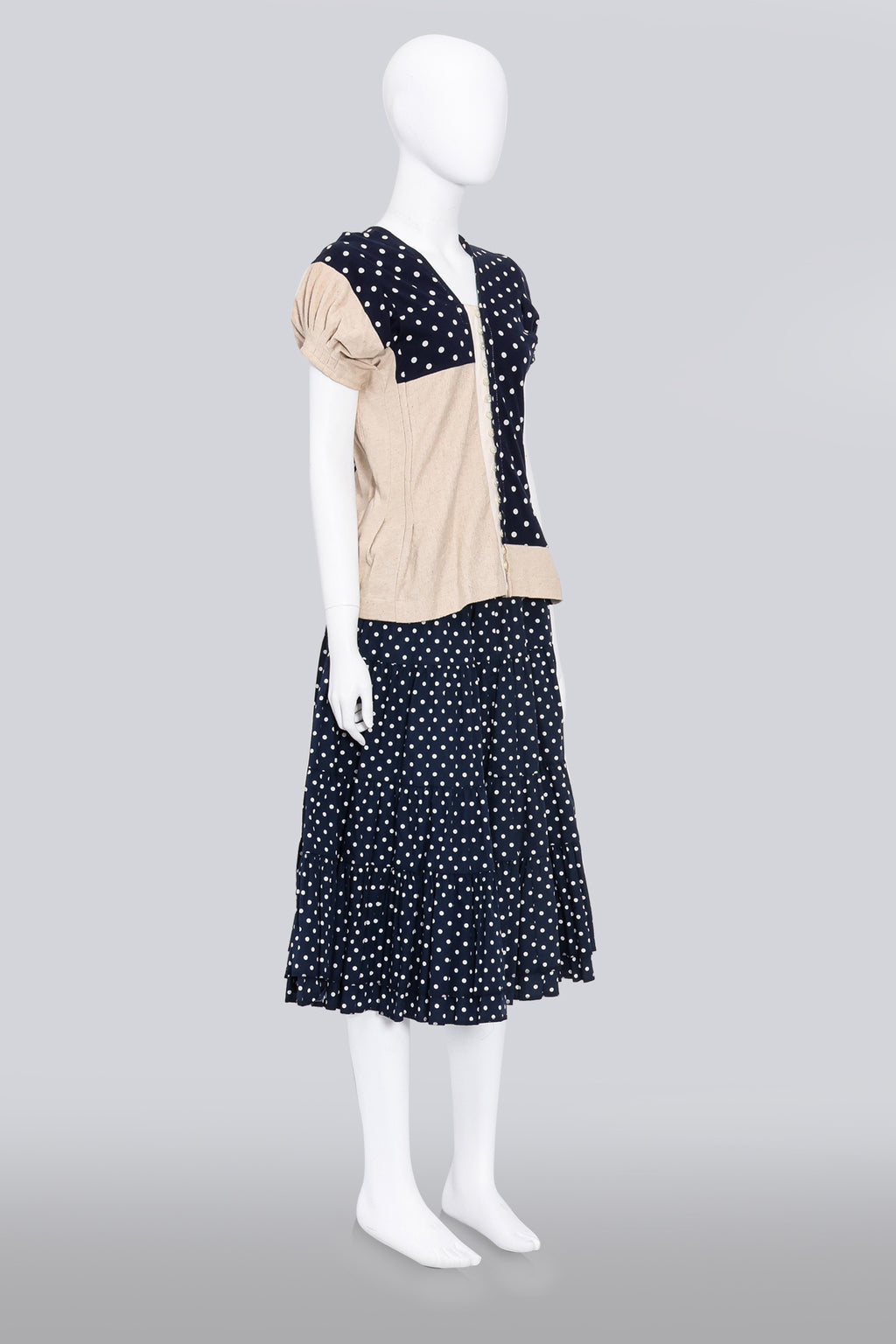 COMME DES GARCONS - A 2007 NAVY AND CREAM MULTI-PANEL POLKA DOT BLOUSE AND MATCHING SKIRT SET