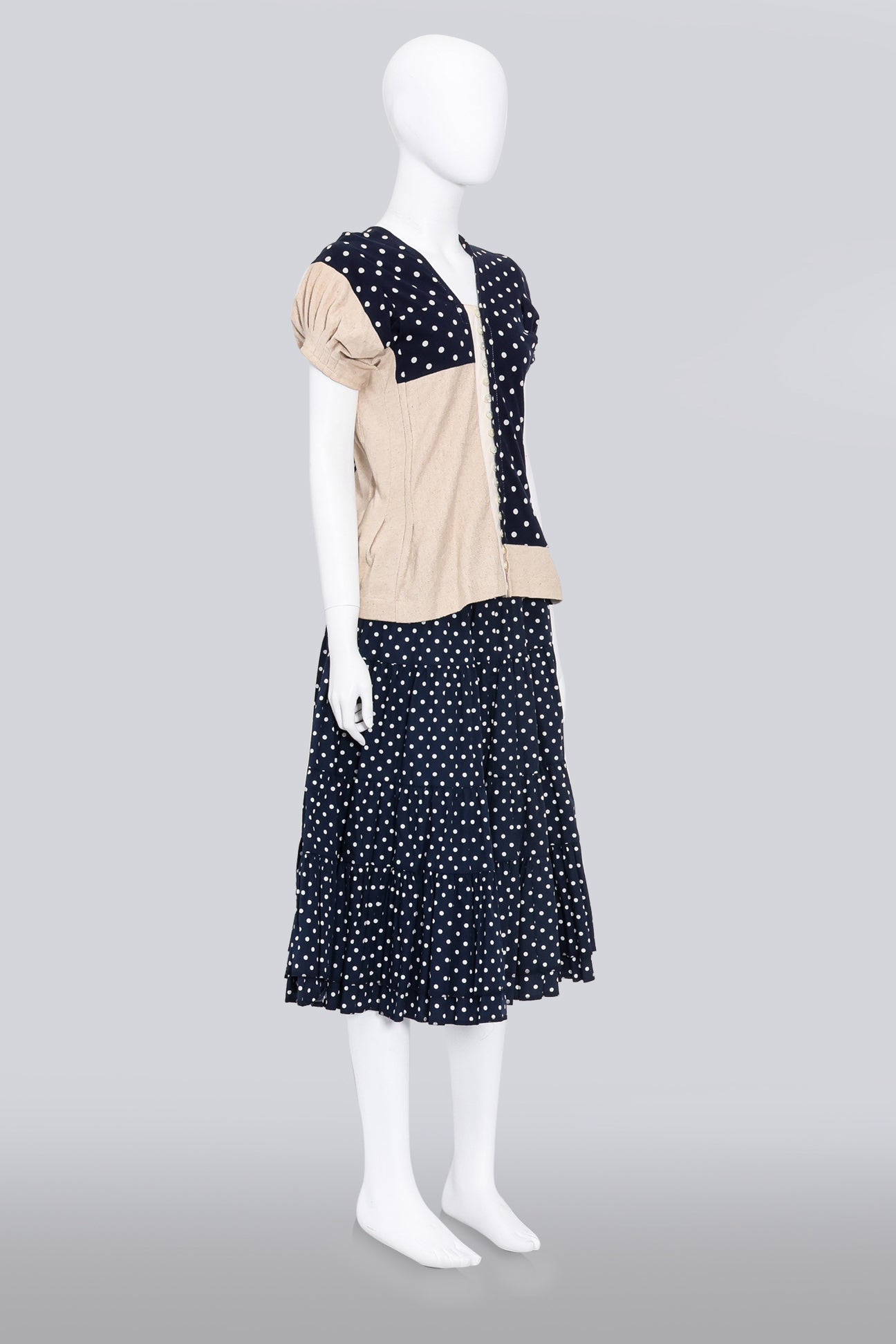 COMME DES GARCONS - A 2007 NAVY AND CREAM MULTI-PANEL POLKA DOT BLOUSE AND MATCHING SKIRT SET