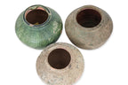 THREE GREEN-GLAZED JARS