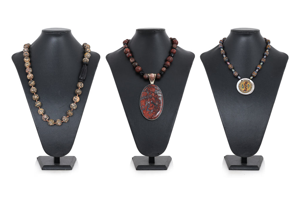 A GROUP OF THREE NECKLACES