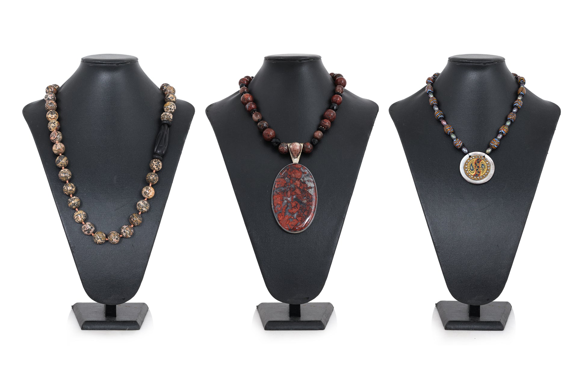 A GROUP OF THREE NECKLACES