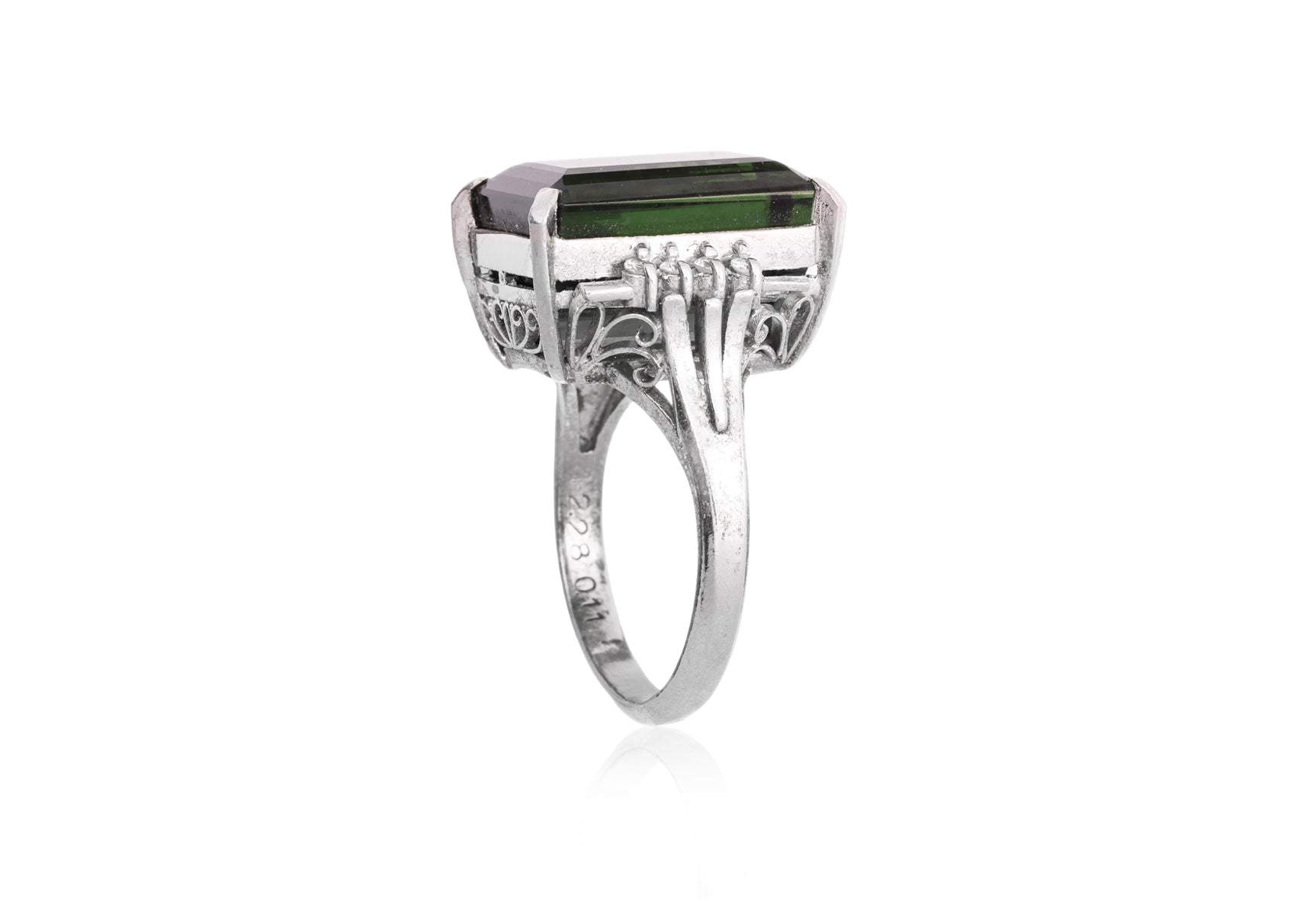 A LARGE GREEN TOURMALINE AND DIAMOND RING