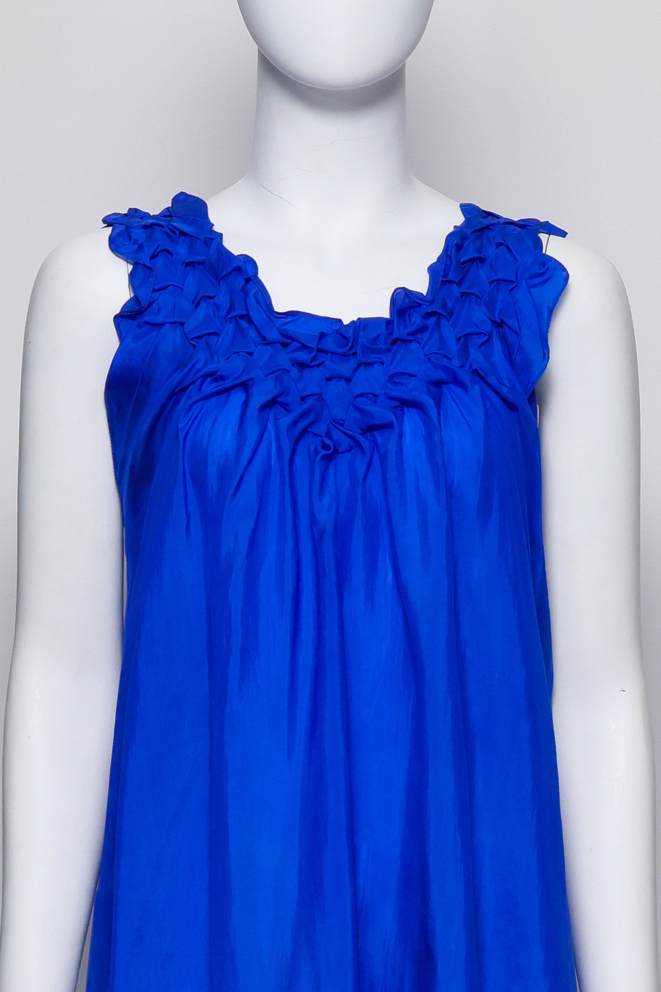 AKIRA – A COBALT BLUE SILK DRESS WITH RUFFLED NECKLINE