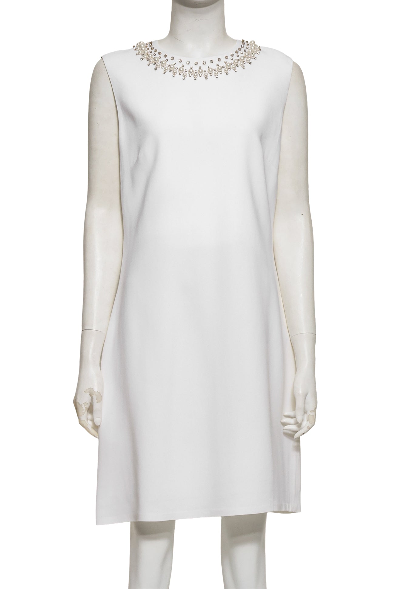 GIVENCHY - A WHITE SLEEVELESS DRESS WITH FAUX PEARL EMBELLISHMENT