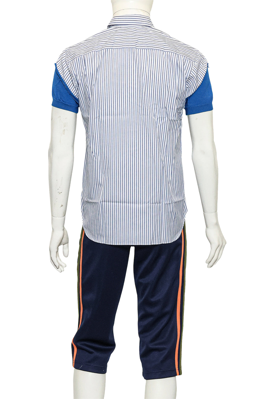 COMME DES GARCONS SHIRT - A STRIPED BUTTON-UP SHIRT AND TRACK PANTS ENSEMBLE