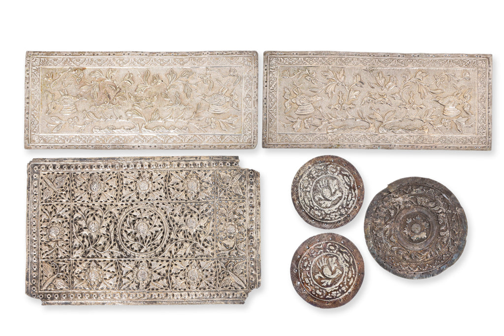 A GROUP OF SIX SILVER PILLOW AND BOLSTER ENDS