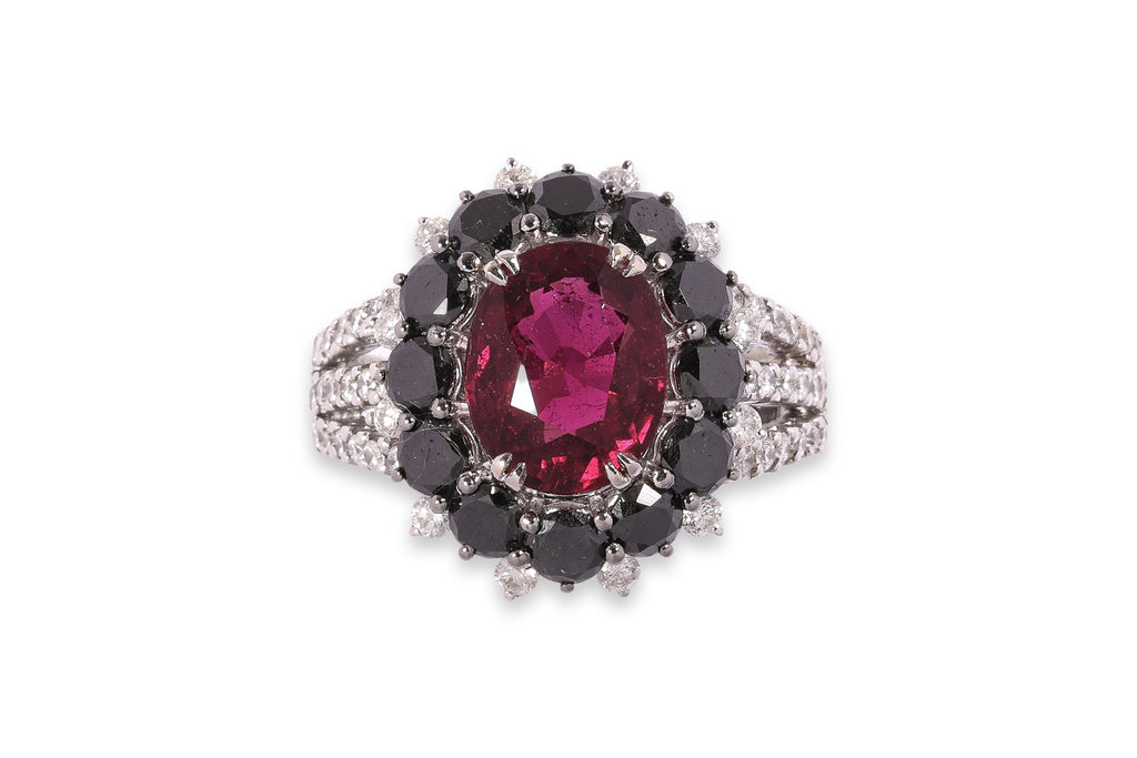 A TOURMALINE, BLACK DIAMOND AND DIAMOND RING