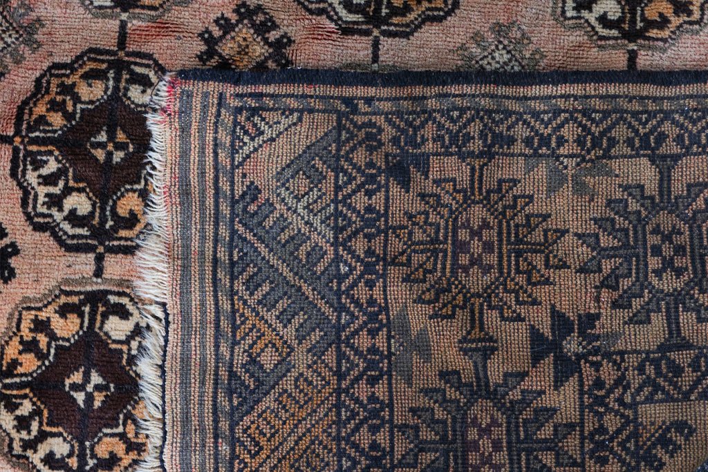 AN AFGHAN ELEPHANTS FOOT CARPET (302 X 193CM)