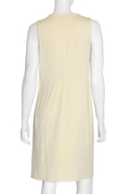 CALVIN KLEIN COLLECTION - A SLEEVELESS DRESS WITH BRONZED MEDALLION DETAIL