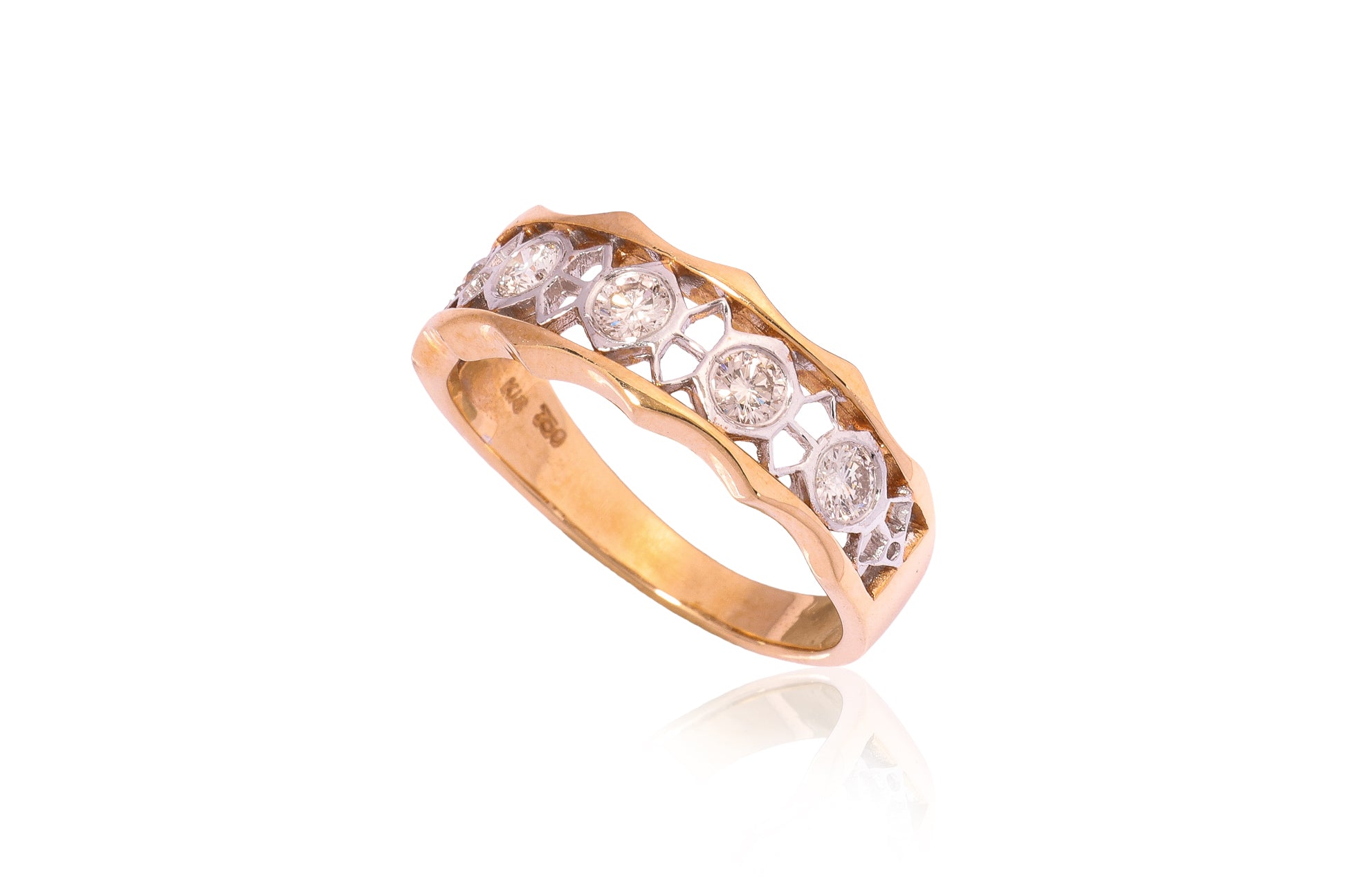 A PIERCED DIAMOND TWO TONE RING
