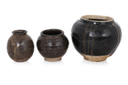 A GROUP OF THREE HENAN BLACK-GLAZED JARS