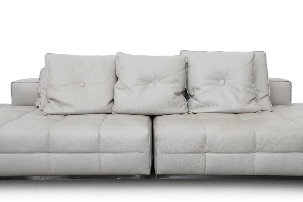 A MINOTTI CONTEMPORARY TWO PIECE LEATHER SOFA