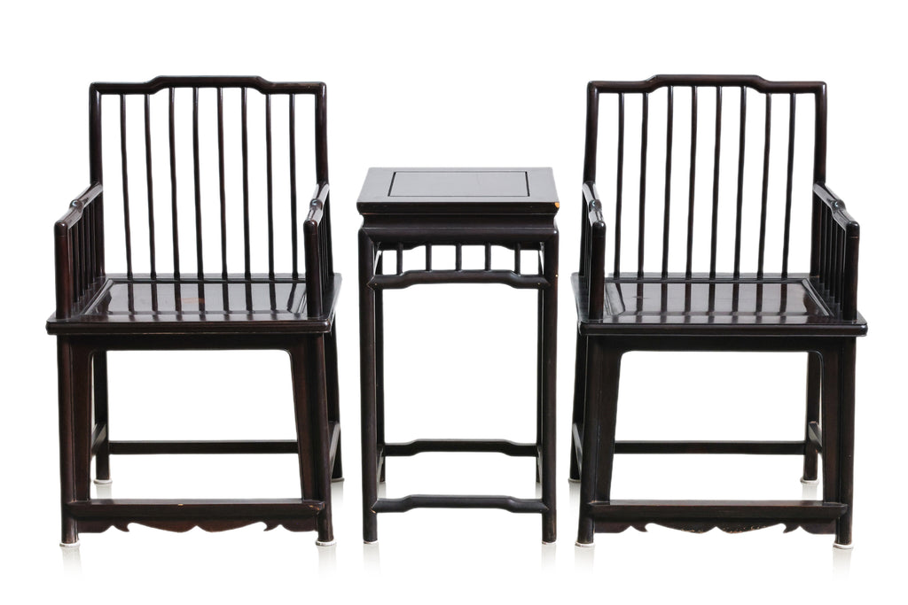A PAIR OF RAIL BACK HARDWOOD ARMCHAIRS AND SIDE TABLE