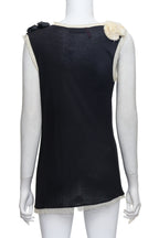 VALENTINO - A BLACK 'T-SHIRT COUTURE' TOP WITH FLORAL APPLIQUÉ