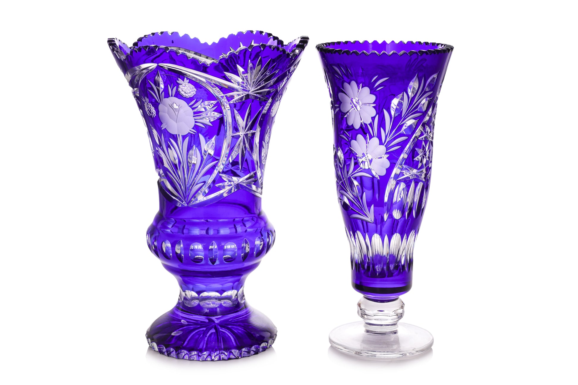 THREE LARGE COLOURED CUT TO CLEAR CRYSTAL VASES