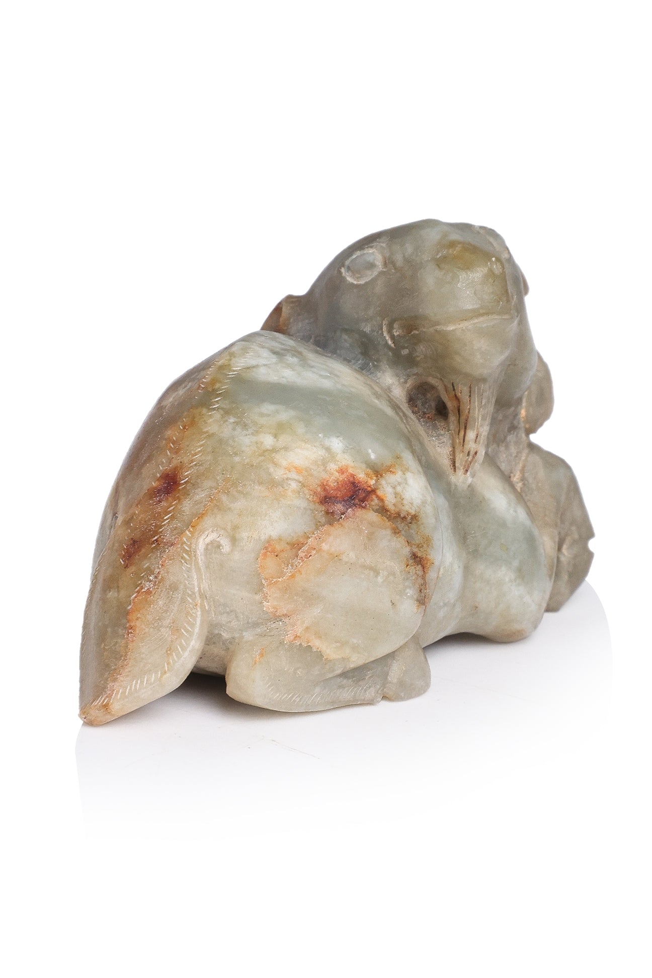 A JADE CARVING OF A RAM