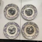 A PART SET OF FOUR FRENCH OPAQUE DE GIEN 'LES GRANDE CHASSES' PORCELAIN PLATES