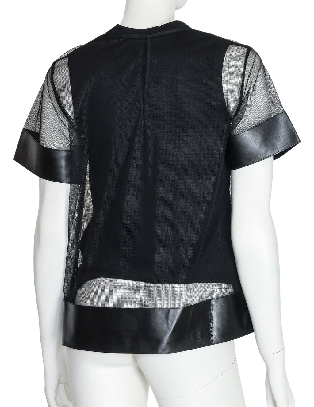NOIR KEI NINOMIYA - A BLACK POLYESTER AND SYNTHETIC LEATHER TOP, 2017