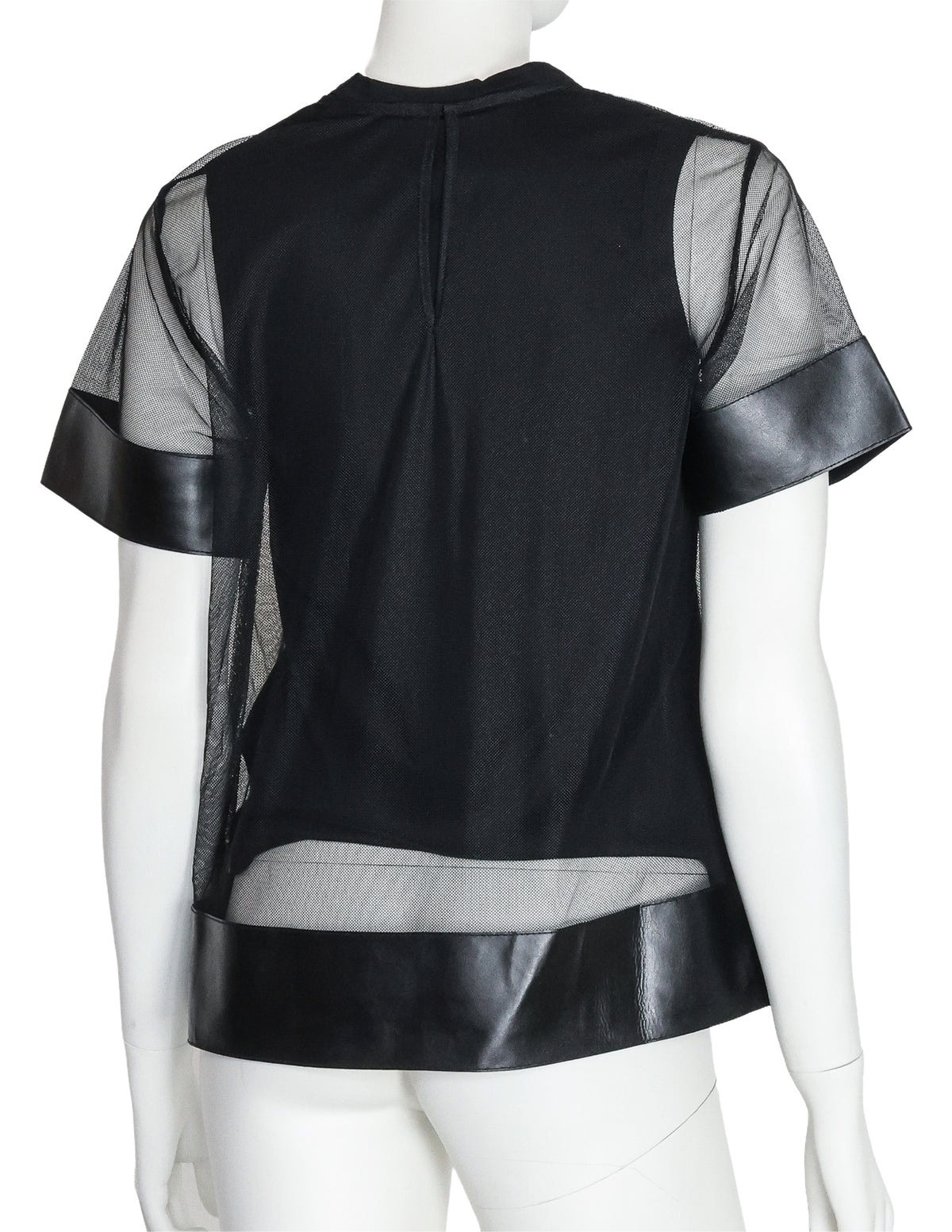 NOIR KEI NINOMIYA - A BLACK POLYESTER AND SYNTHETIC LEATHER TOP, 2017