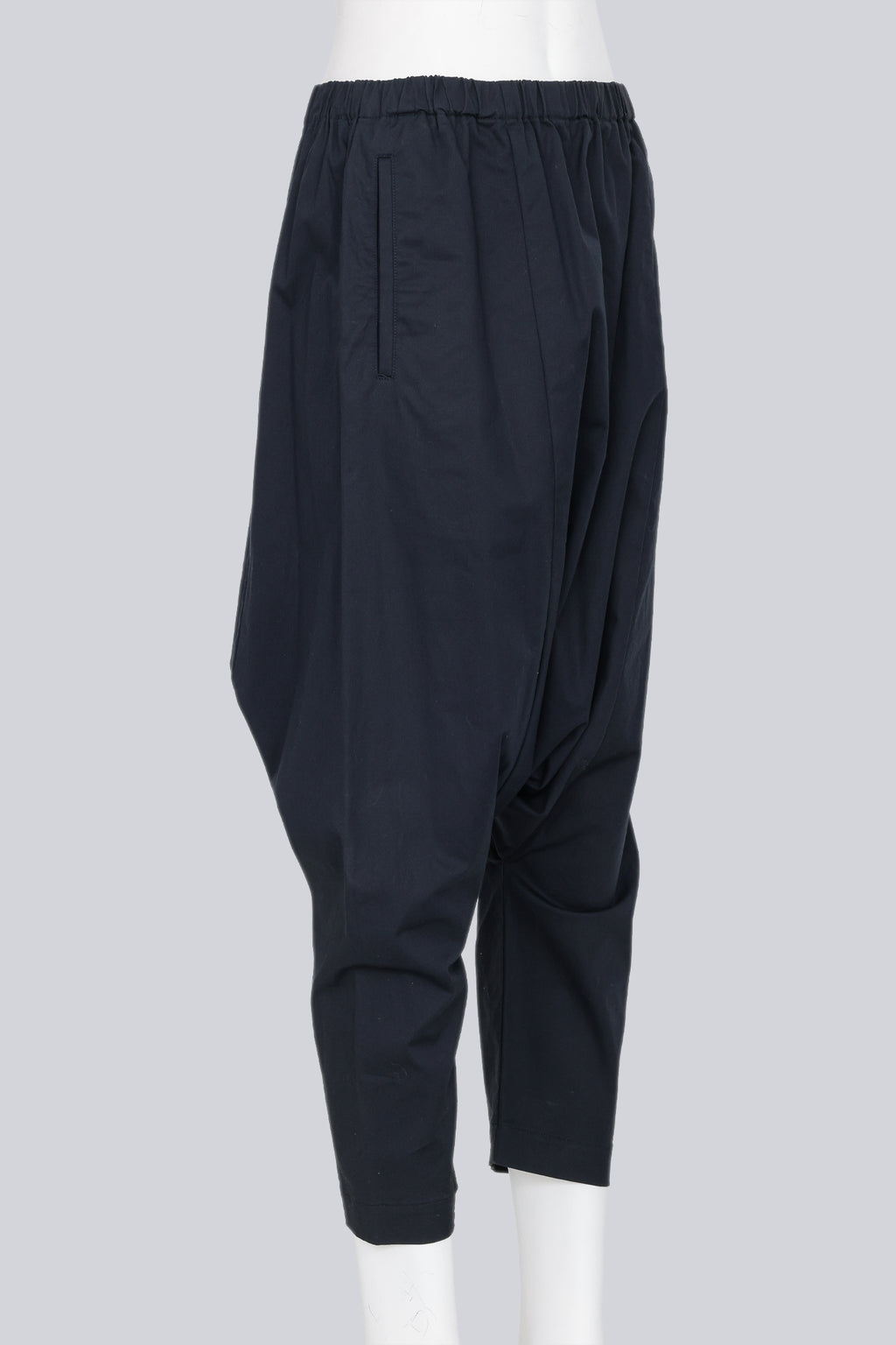 COMME DES GARCONS - A PAIR OF 2014 COTTON BLEND NAVY DROP CROTCH TROUSERS