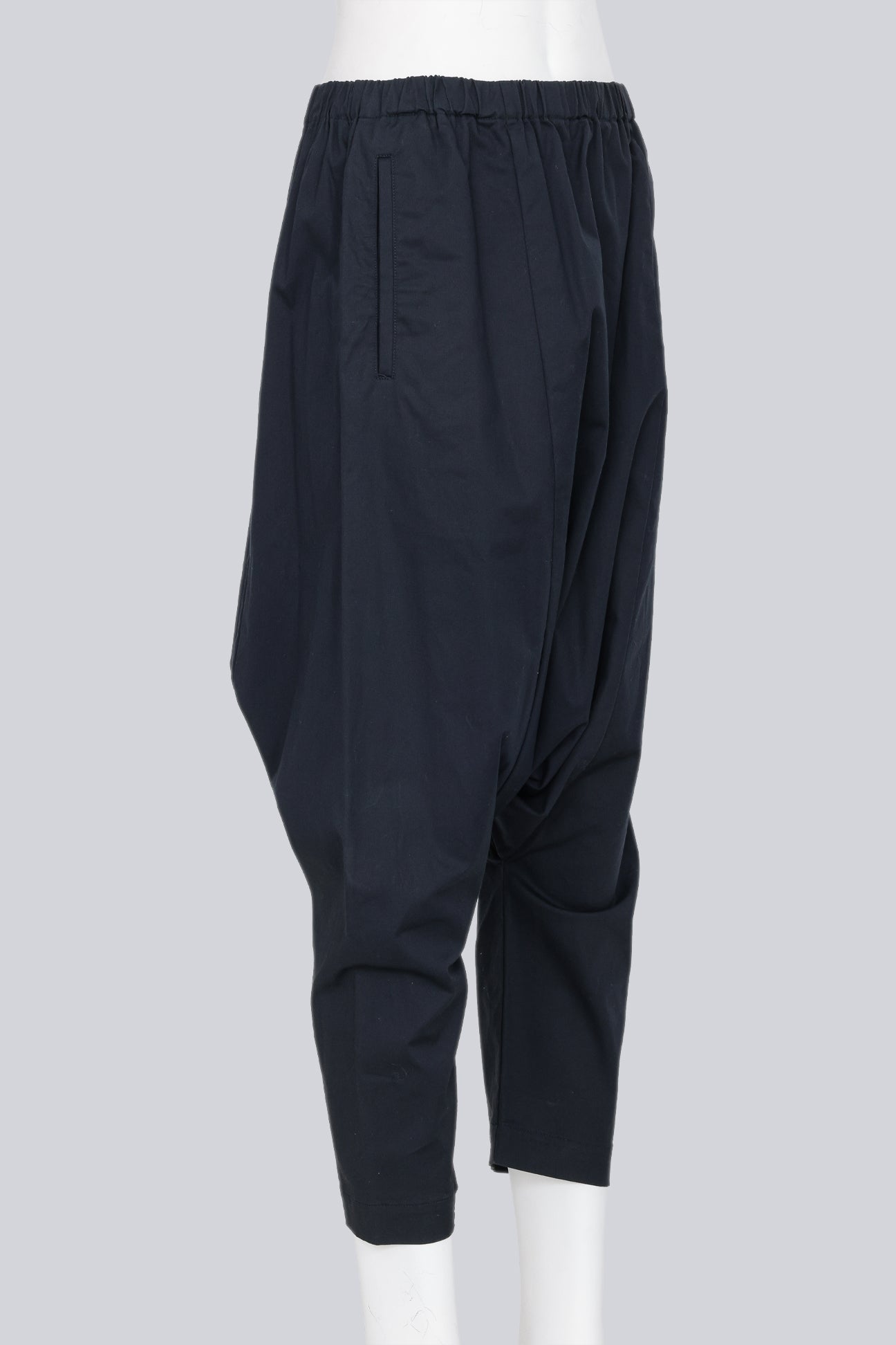 COMME DES GARCONS - A PAIR OF 2014 COTTON BLEND NAVY DROP CROTCH TROUSERS