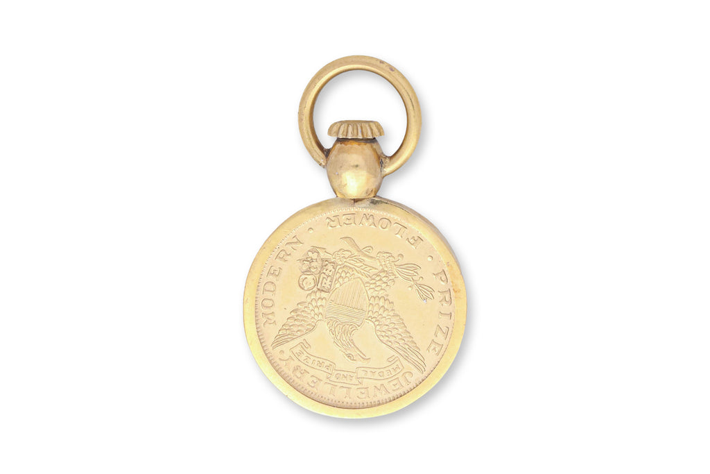 A PRIZE JEWELLERY MODERN FLOWER GOLD PENDANT
