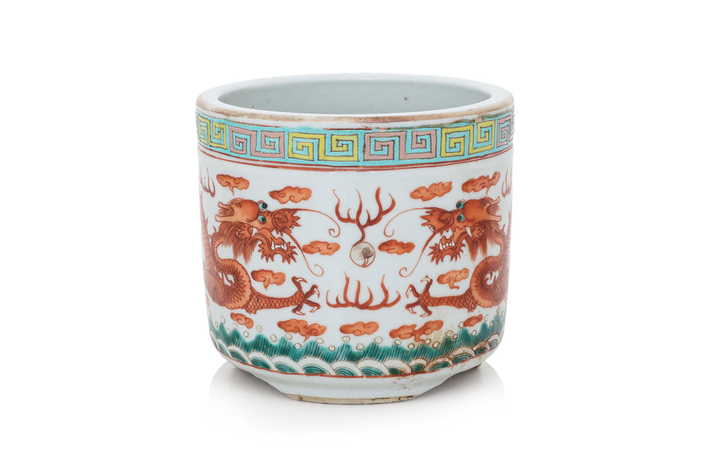 A FAMILLE ROSE 'DRAGON' JOSS STICK HOLDER AND A 'SAN DUO' FOOTED DISH