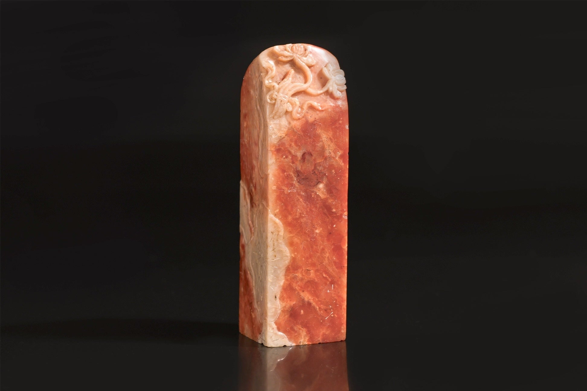 A CARVED SOAPSTONE 'LOTUS' SEAL
