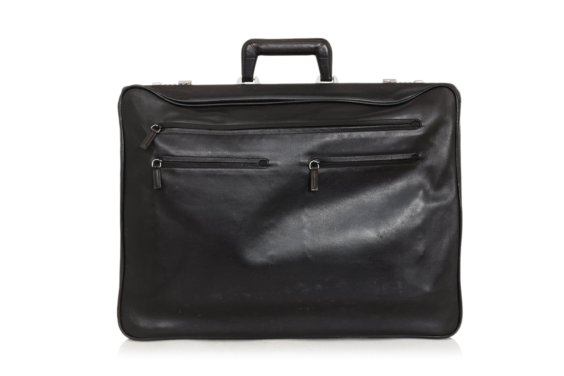 SEEGER – A VINTAGE BLACK LEATHER SUITCASE