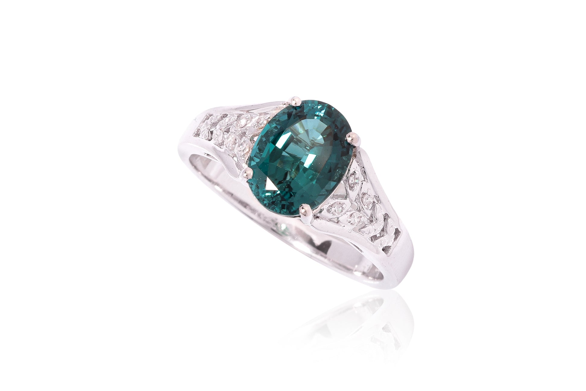 A GREENISH-BLUE TOURMALINE AND DIAMOND RING