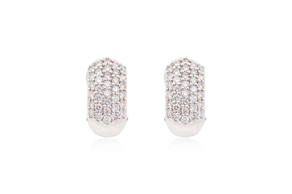 A PAIR OF PAVÉ-SET DIAMOND EARRINGS