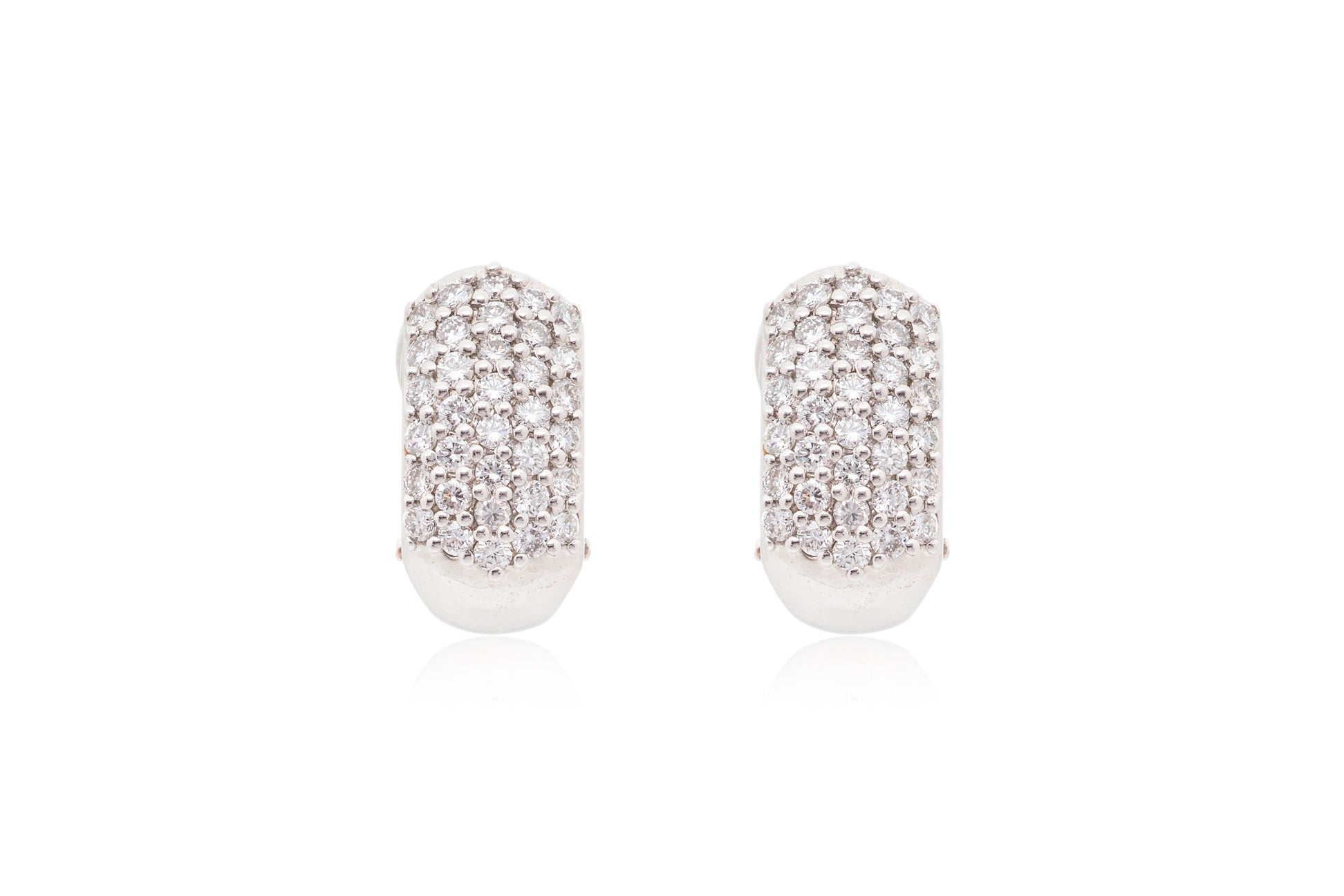 A PAIR OF PAVÉ-SET DIAMOND EARRINGS