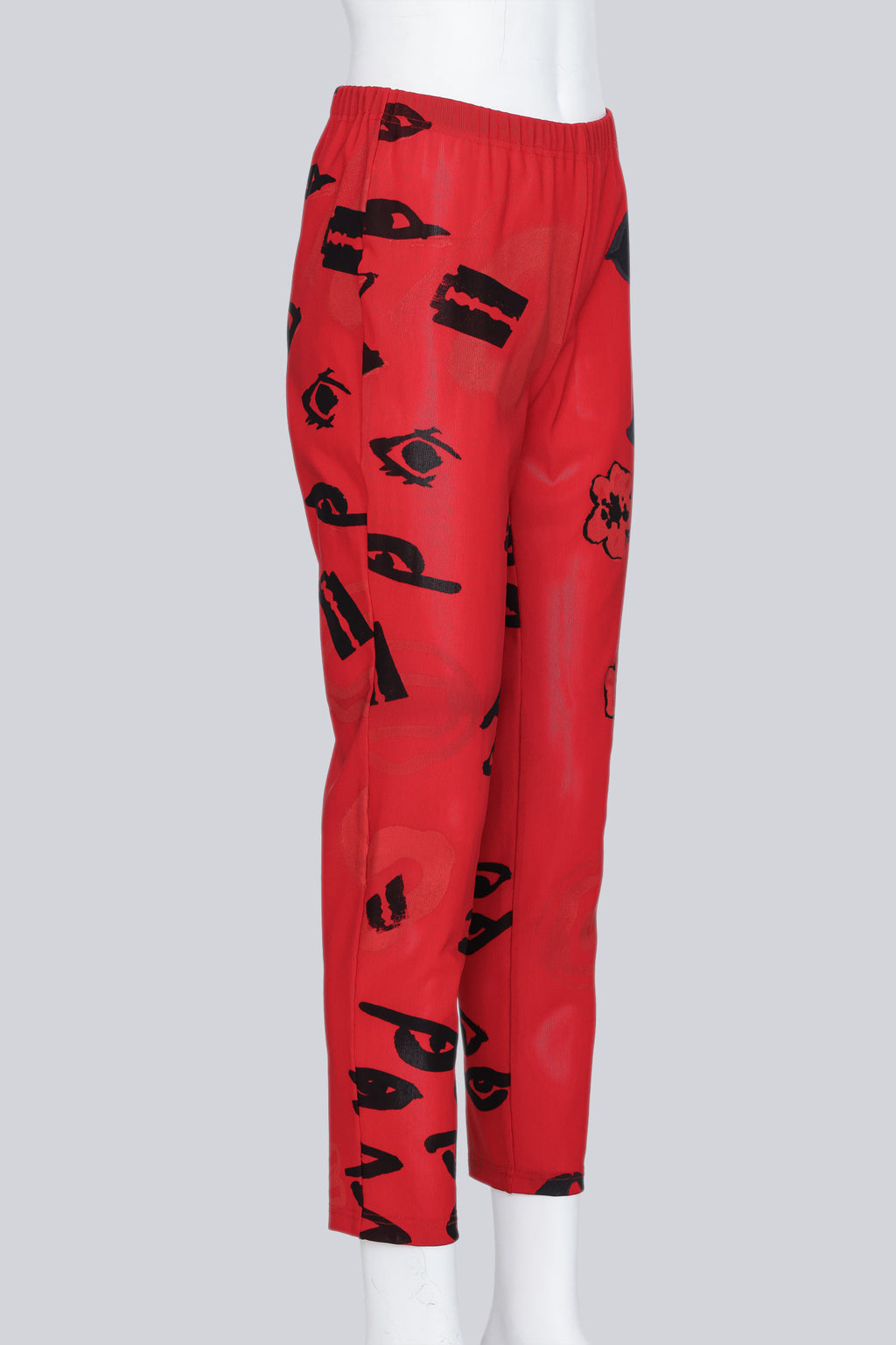 COMME DES GARCONS - A PAIR OF 2000 RED AND BLACK GRAPHIC PRINT PANTS