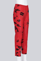 COMME DES GARCONS - A PAIR OF 2000 RED AND BLACK GRAPHIC PRINT PANTS