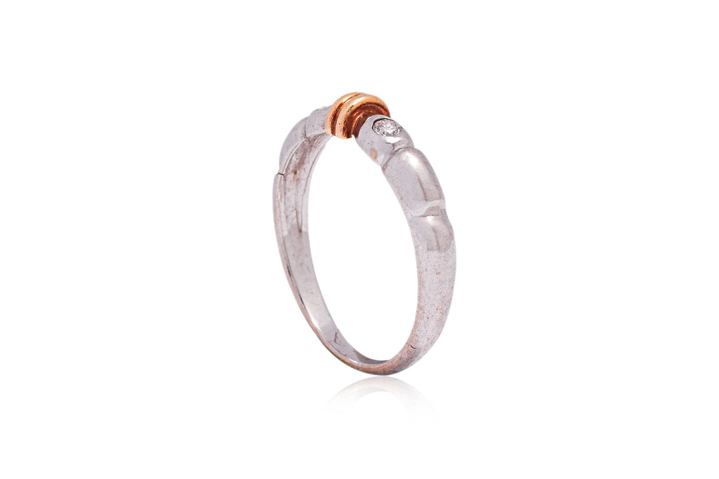A TWO TONE DIAMOND BAND RING