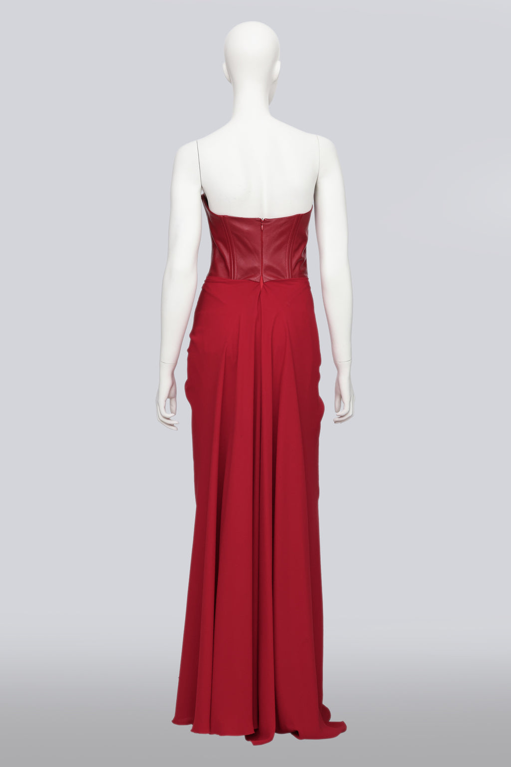 SANDRA WEIL - A RED STRAPLESS DRESS WITH LEATHER BODICE
