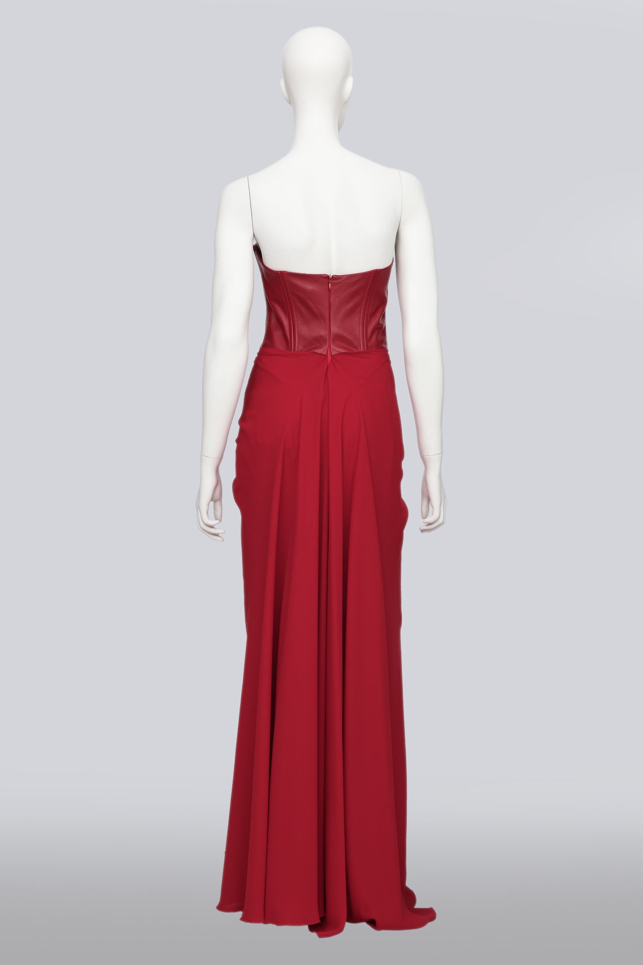 SANDRA WEIL - A RED STRAPLESS DRESS WITH LEATHER BODICE