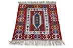 A TRIBAL KILIM RUG WITH GEOMETRIC DESIGN (110 x 98CM)