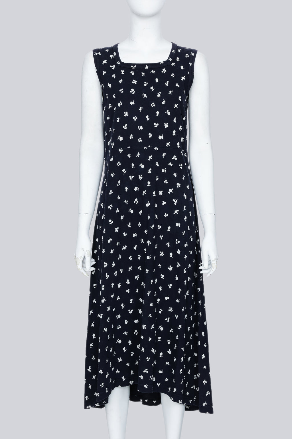 COMME DES GARCONS - A NAVY DRESS WITH A WHITE FLORAL PATTERN
